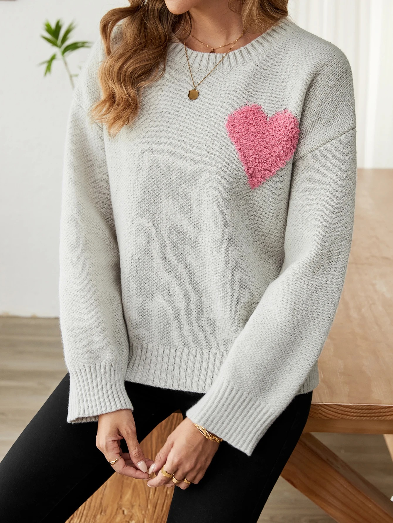 Soft knitted sweater with heart pattern