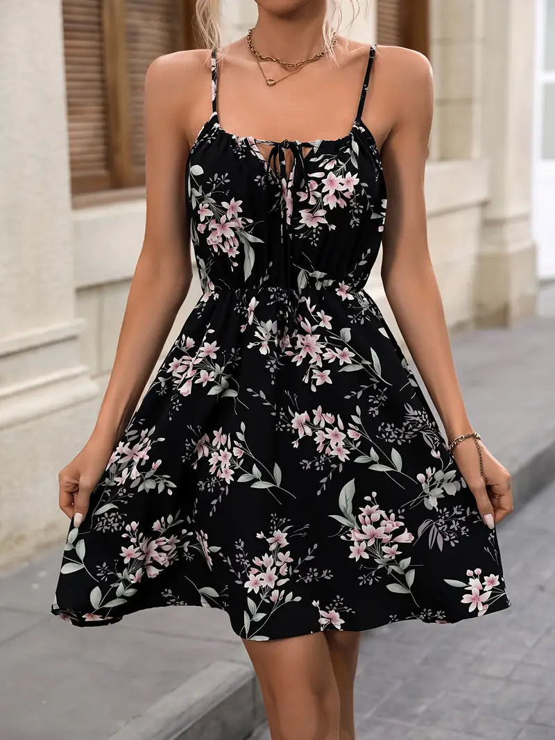Vacation dress with floral pattern, narrow waist and spaghetti straps