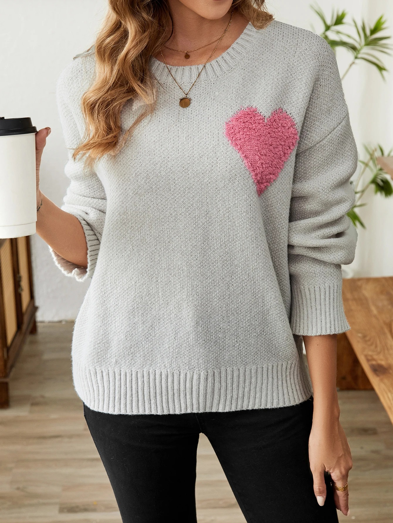Soft knitted sweater with heart pattern