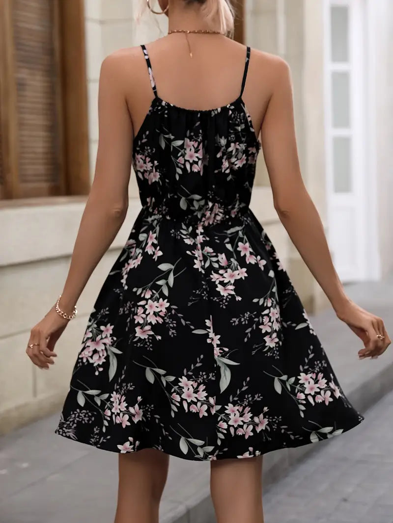 Vacation dress with floral pattern, narrow waist and spaghetti straps
