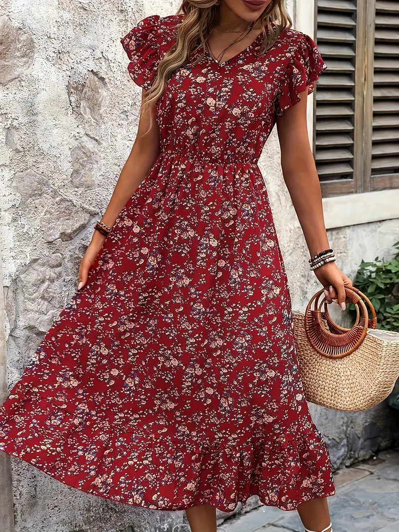 Floral dress with V-neckline and elegant ruffled sleeves