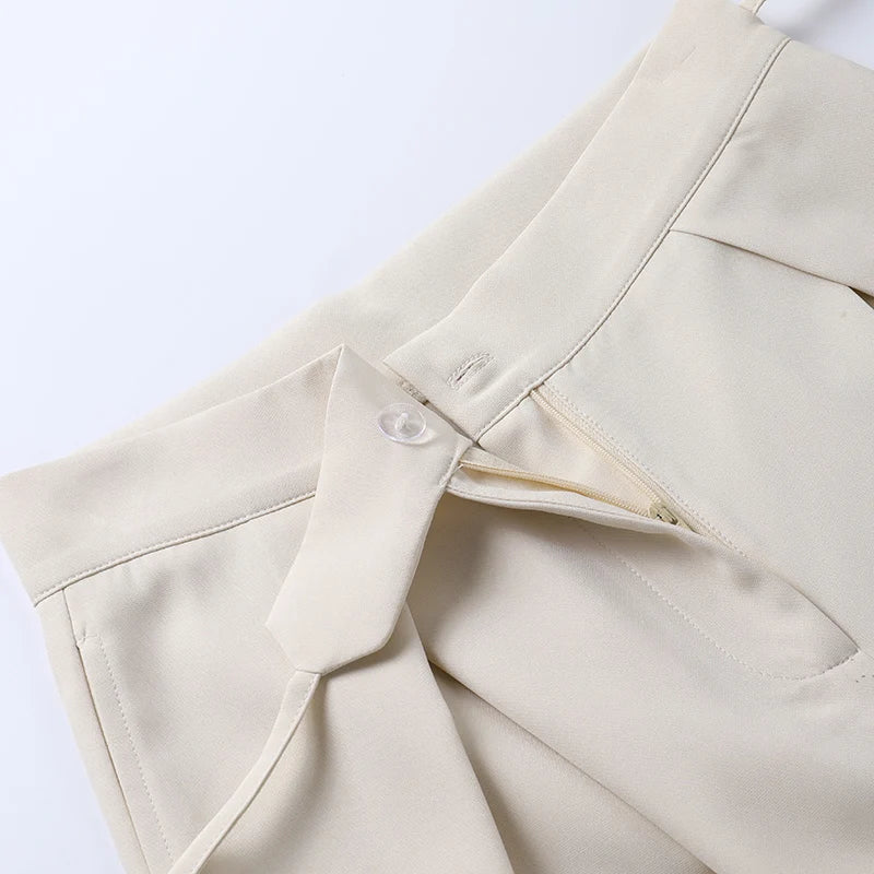 Pants with high waist and button placket
