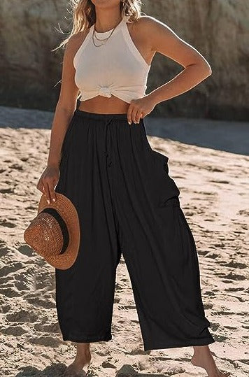 Wide-leg pants in cotton and linen with elastic waistband and pockets