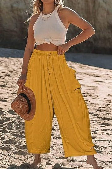 Wide-leg pants in cotton and linen with elastic waistband and pockets