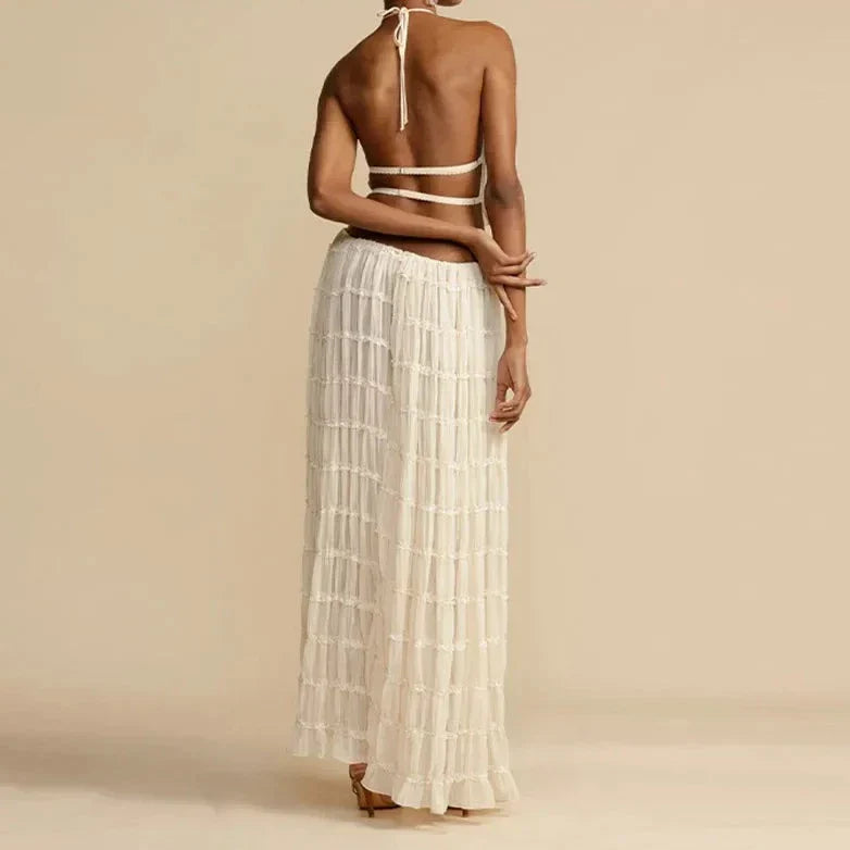 Stylish set consisting of a backless top and maxi skirts