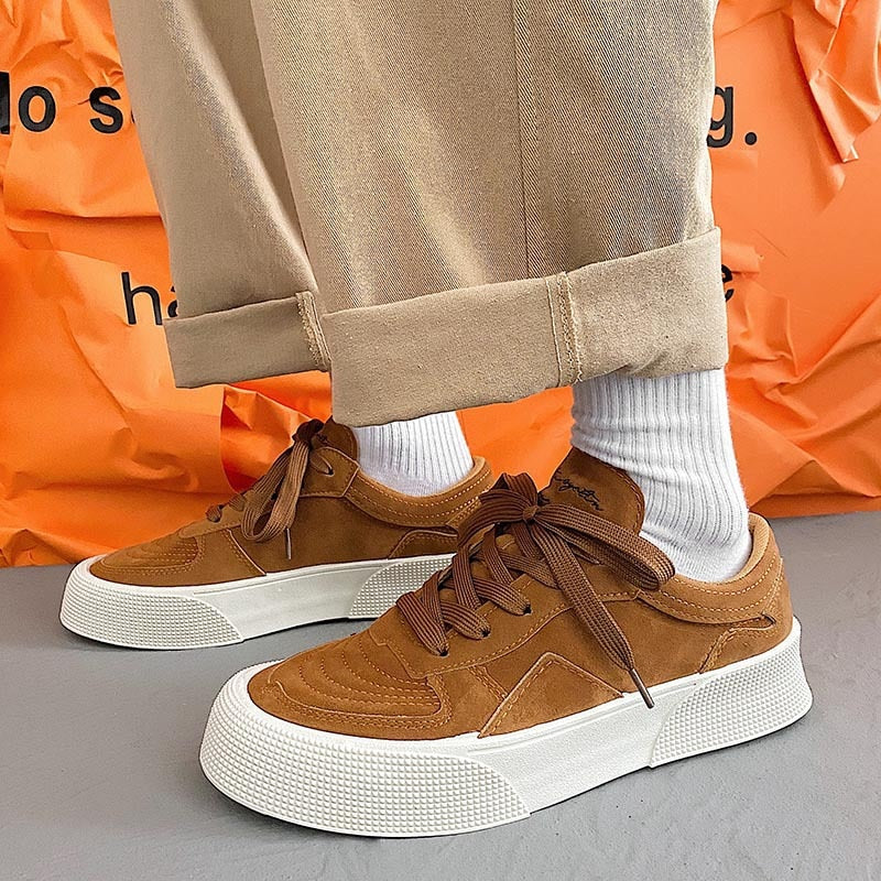 Suede lace-up sneakers with a thick sole