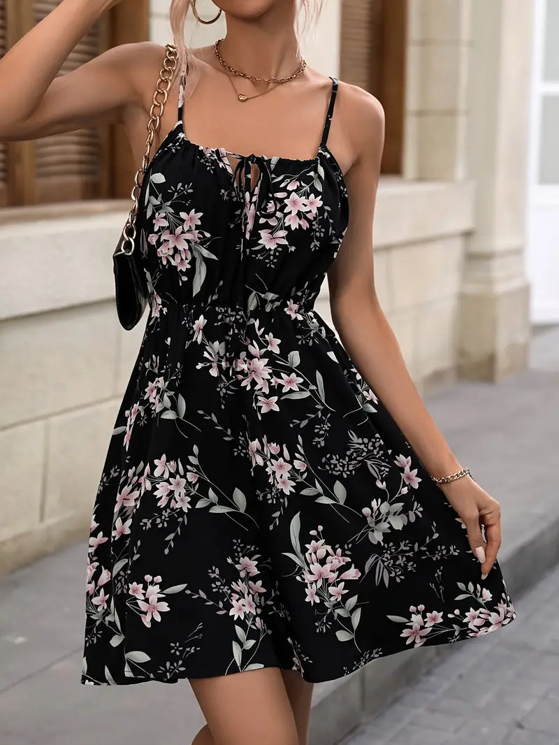 Vacation dress with floral pattern, narrow waist and spaghetti straps