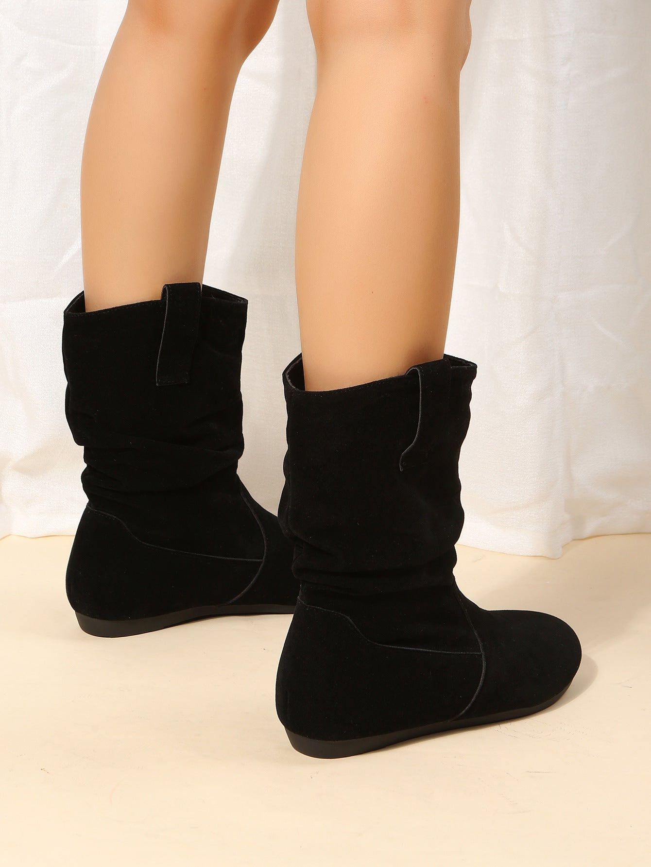 Plush boots with flat soles