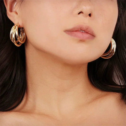 3 gold hoop earrings