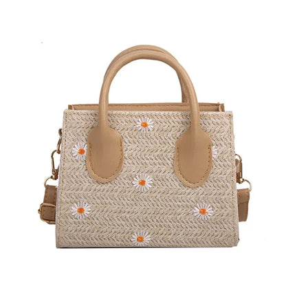 Woven handbag with floral accents